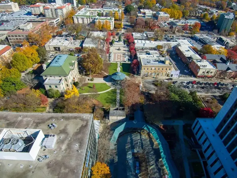 Aerial view of downtown Decatur and the courthouse square under autumn trees